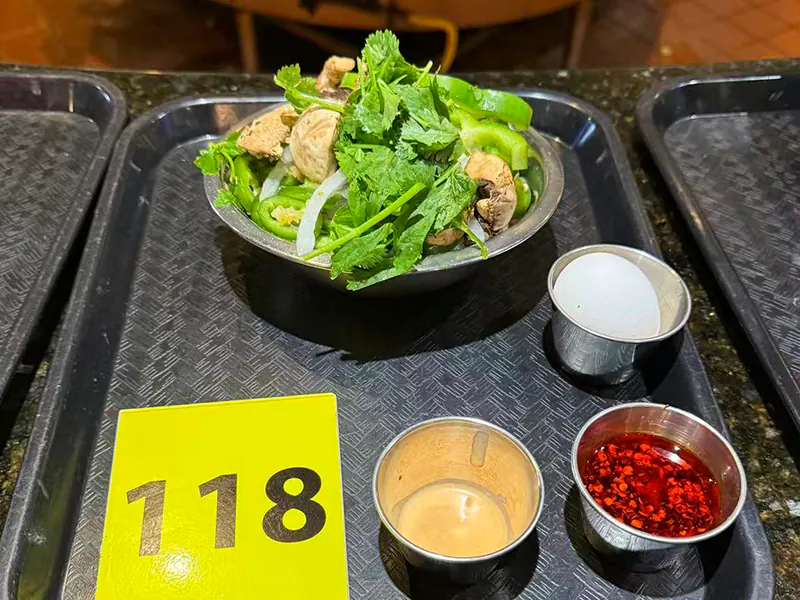 Fresh veggies & protein bowl for Mongolian stir-fry at Kublai Khan Crazy Mongolian Stir Fry & Sushi Bar, a Asian Restaurant in Austin